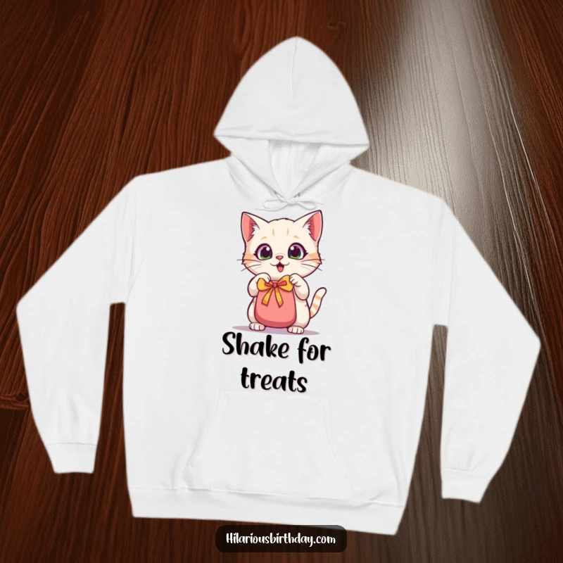 Funny kawaii cat hoodie, a wide-eyed cat energetically shaking a gift bag, symbolizing anticipation and cozy fun.