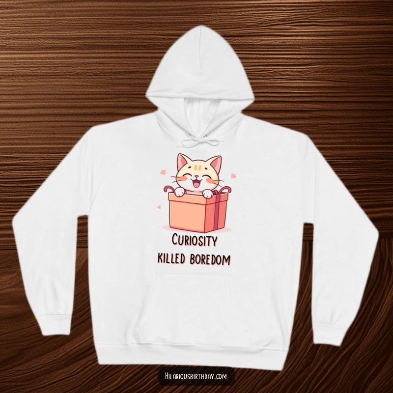 Funny cat hoodie featuring a delighted cat character eagerly opening a large gift box, perfect for cozy excitement.