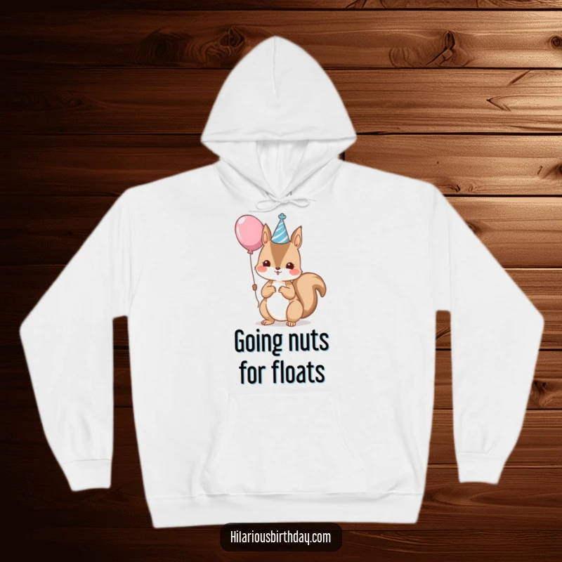 Funny kawaii squirrel in party hat holding a balloon, a cozy hoodie design, perfect funny gift.