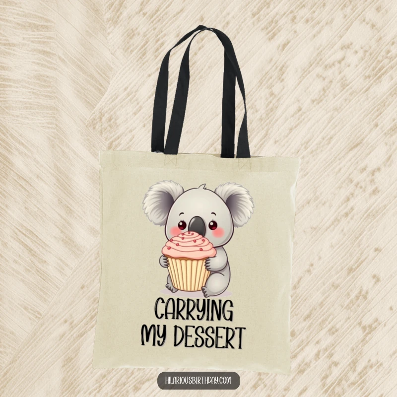 Funny koala holding a giant cupcake with frosting on this tote bag, perfect for carrying treats and treasures.