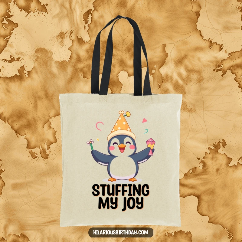 Funny tote bag featuring a happy penguin with a festive hat, gleefully juggling party favors, great for shopping trips.